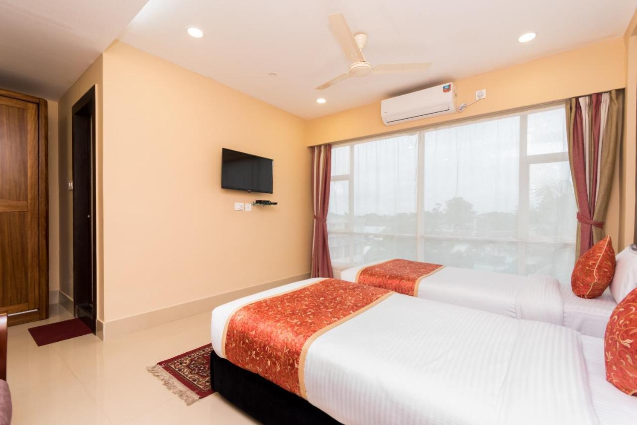 Oyo 9202 Hotel Central Courtyard สิริกุรี ภายนอก รูปภาพ